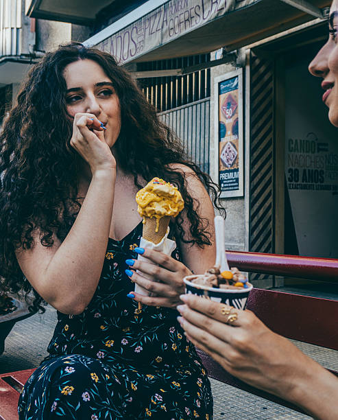 istock Friends on the Street with Ice Cream 2235785802