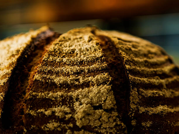 freshly baked black bread bun beautiful with crust homemade baking close-up