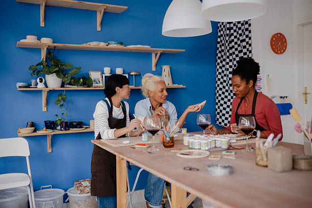 istock Multicultural Group of Women Enjoying Wine at Pottery Workshop 2235804067