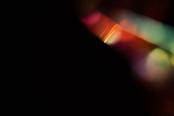istock colorful rainbow crystal light leaks on black background 2235804927