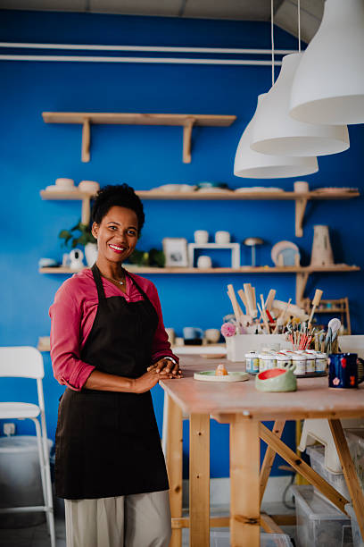 istock Black Woman Working in Her Pottery Studio 2235805729