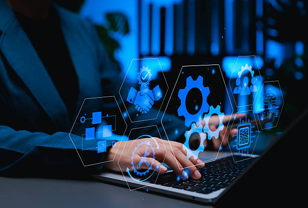 istock BPA Business process automation concept. A professional using laptop with digital icons of gear, flowcharts, cloud computing, tools, representing automation, optimization, business workflow technology 2235826704