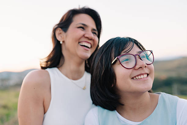 istock Mother and daughter laughing together 2235832146