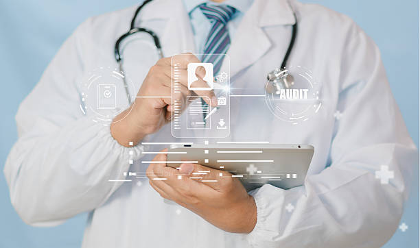 istock Concept e-signature compliance in healthcare, showing doctor using tablet, secure audit interface, symbolizing patient consent, legal verification, data protection, efficient medical documentation. 2235835904
