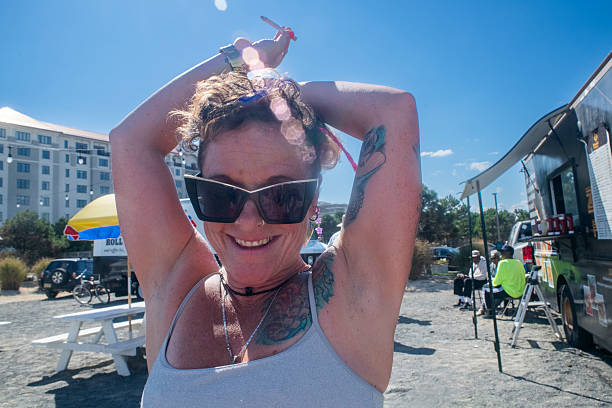 istock Carefree Woman Dancing At Boardwalk 2235838243