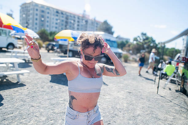 Carefree Woman Dancing At Boardwalk in United States, New Jersey, Asbury Park