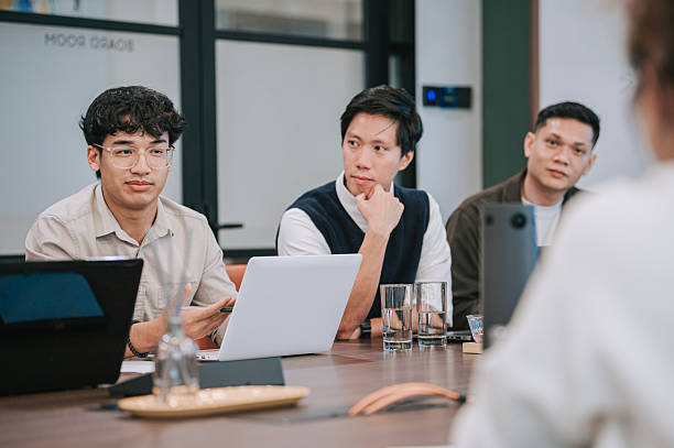 istock Asian Business team discussing ideas during office meeting 2235841819