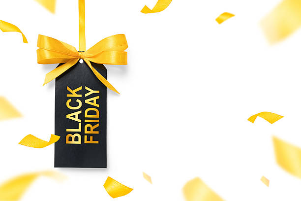 Black Friday gift tag with golden bow and white background with copy space