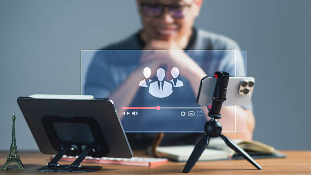 istock Man Engaging in Online Group Meeting or Live Stream on Mobile Devices 2235852286