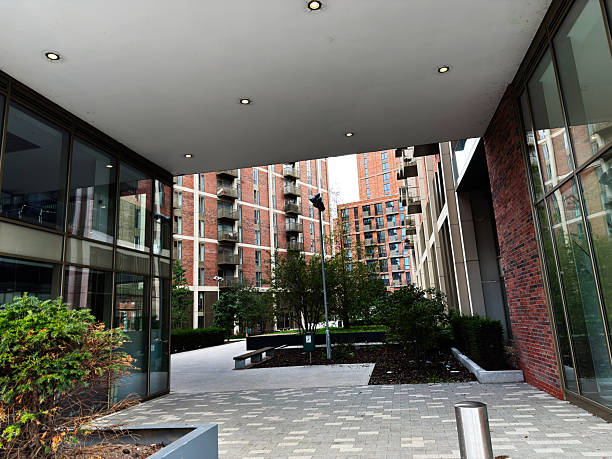 Contemporary urban architecture featuring a blend of greenery and structural design in Salford