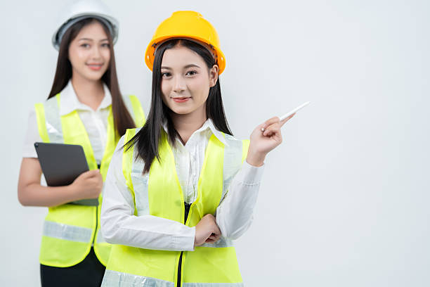 istock 2 Asian female engineers working with architects highlight leadership and vision, ensuring their industry remains competitive while shaping global business strategies through innovation. 2235859668