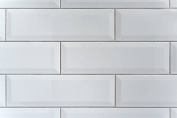 istock Ceramic white brick wall background. Concept of bathroom, kitchen, modern, retro, ceramic, texture 2235861337