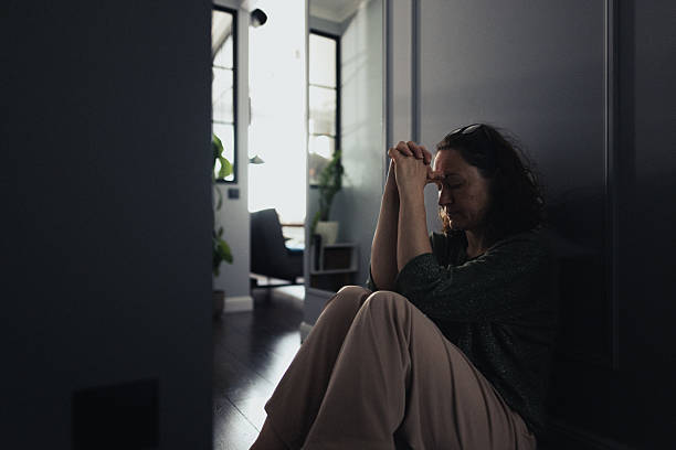 istock Woman lost in deep thoughts. Depression and life problems concept 2235861700