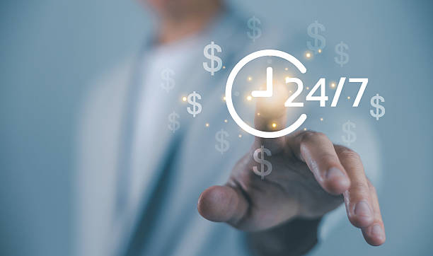istock 24 business service concept with digital clock and dollar symbols, representing nonstop customer support, online business, financial growth, availability, technology, and modern service industry. 2235864032