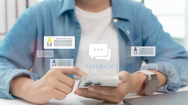 istock Customer feedback and online review rating concept. Person using smartphone with digital rating stars and comments. Modern evaluation, e-commerce service, and business reputation management. 2235871082