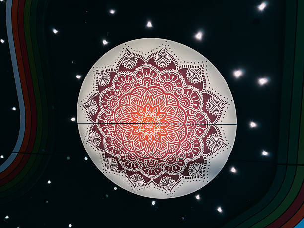 istock Illuminated Red and Orange Mandala Design on a Ceiling with Starry Lights 2235872149