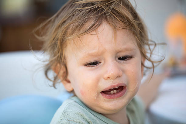 istock 2 years baby boy feeding 2235874122