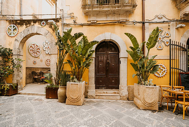 istock Charming Courtyard in Syracuse, Sicily with Mediterranean Plants and Decor 2235875773