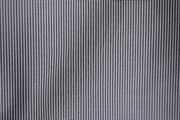 istock fabric for making white tulle , finely woven synthetic threads for making tulle for windows in the home 2235876265