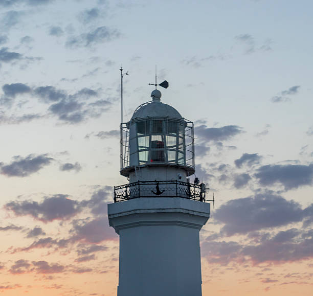 istock Shot of the lighthouse with mountains on the background. 2235876771