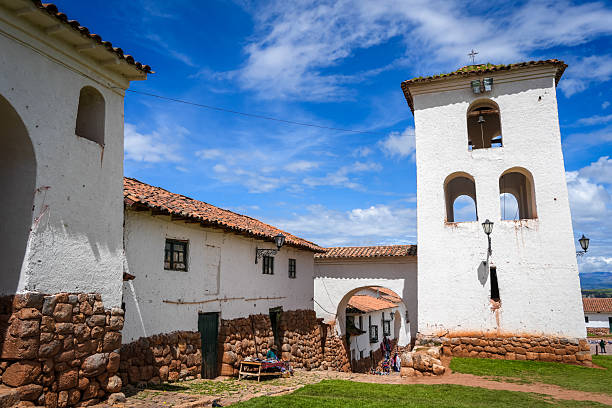 istock Colonial church in Chinchero, Peru, with white adobe bell tower 2235878623