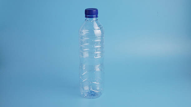 istock Plastic bottle of pure water, isolate on light blue background 2235879521