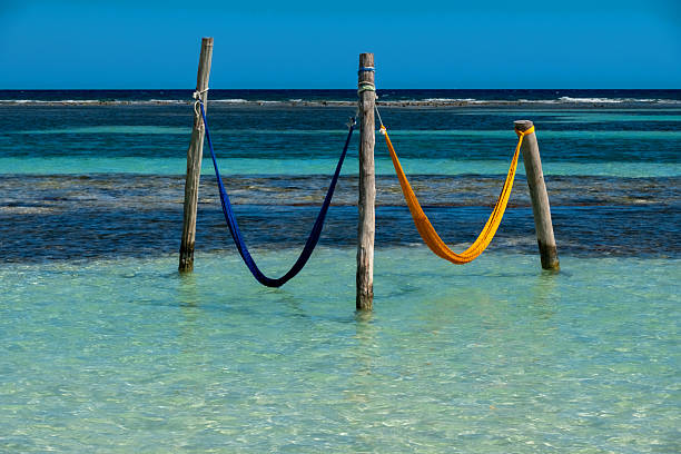 Hammocks in the sea, Mexico.