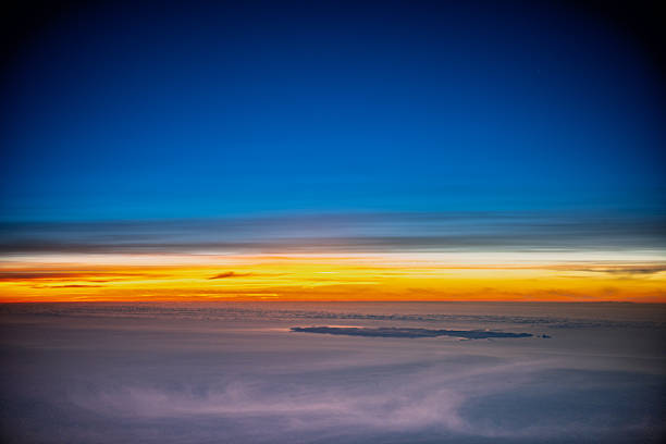 Dawn breaks over Spain with vibrant orange and blue hues