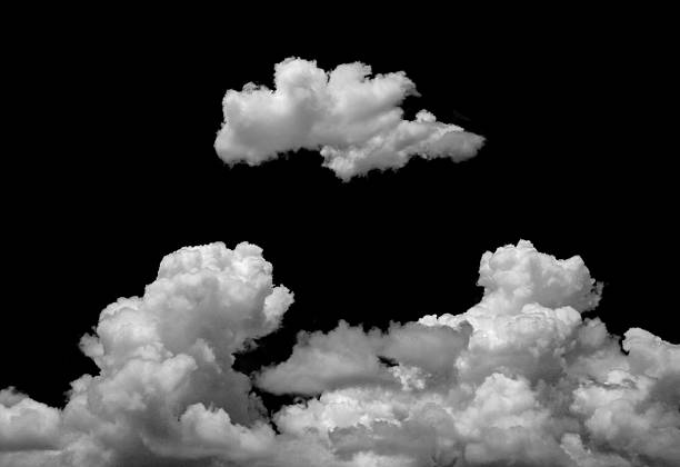 istock White fluffy clouds isolated on black background, symbolizing sky, weather, atmosphere, dream, imagination, freedom, abstract texture, climate, environment, nature, and dramatic cloudy effect. 2235892164