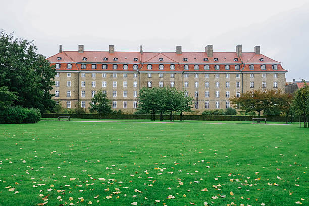 Beautiful architecture building in danish style with different windows for floor in Copenhagen, Denmark.