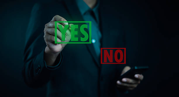 istock Businessman choosing between yes and no options on virtual screen, symbolizing decision making, choice, and strategic planning in modern business and technology concepts. 2235894352