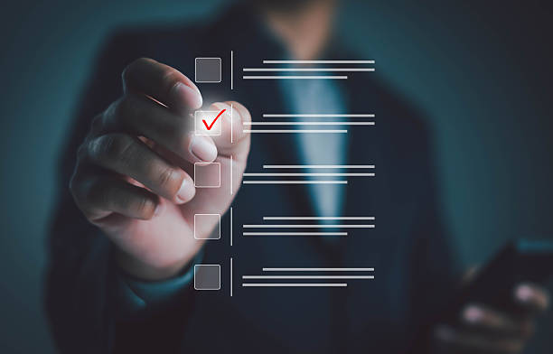 istock Businessman hand selecting checklist item on virtual screen, symbolizing task management, project planning, business strategy, productivity, online survey, goal achievement and digital organization concept. 2235894468