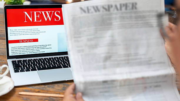 istock business woman using tablet pc for reading news 2235900844