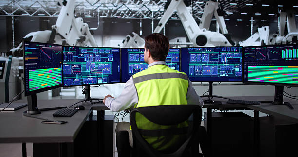 istock Engineer Supervising Manufacturing Process In Vehicle Production Facility 2235904846