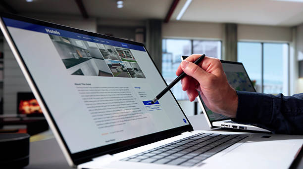 istock Elderly Man Booking Discount Hotel Online Using Laptop Device 2235908782