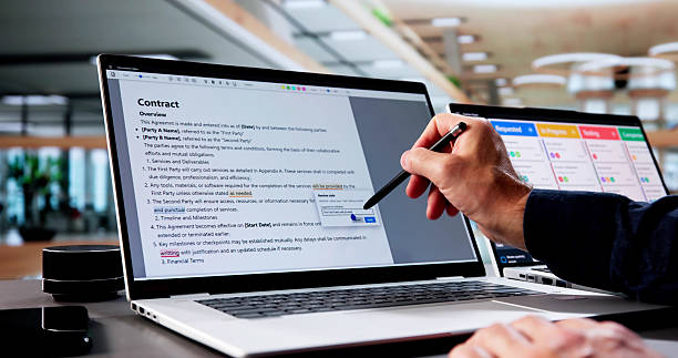 istock Senior Online Editor Proofreads Manuscript For Publication 2235908816
