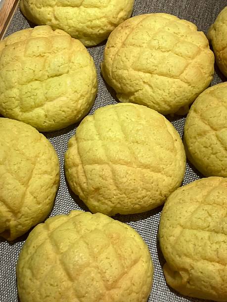 istock Melon Ppang, a fluffy Korean bread shaped like a melon with a crisp, sugary top layer. Popular for its sweet flavor and unique look, it's a delightful treat perfect for snacks or desserts. 2235910982