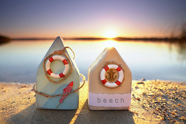 self crafted Driftwood Beach Houses with Maritime Decor at Sunset