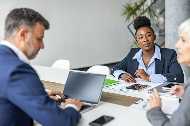 istock Business people working together in modern office 2235916355