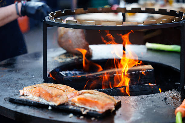 istock BBQ Grill with Meat and Fisch 2235919570