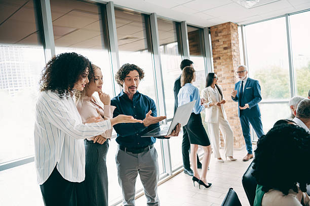 istock Professional team engaging in a collaborative workplace discussion during a corporate meeting in a bright modern office environment 2235919634
