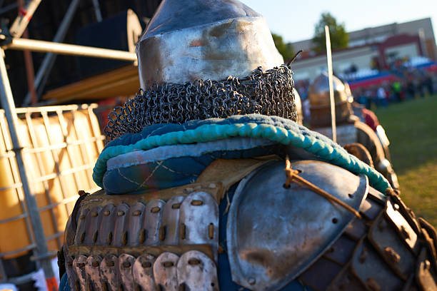 istock Medieval Reenactor Wearing Armor Participating in Outdoor Historical Event 2235919661