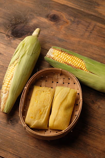 istock Lepet Jagung. Corn lepet is a typical Indonesian snack made from sweet corn. 2235920582