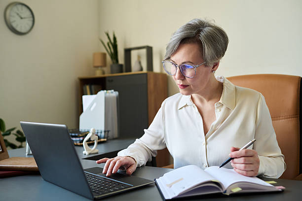 istock Woman Working as Psychologist Taking Notes at Desk 2235922583