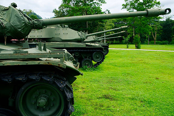 istock Military Tanks on Display in Lush Green Outdoor Setting 2235923405