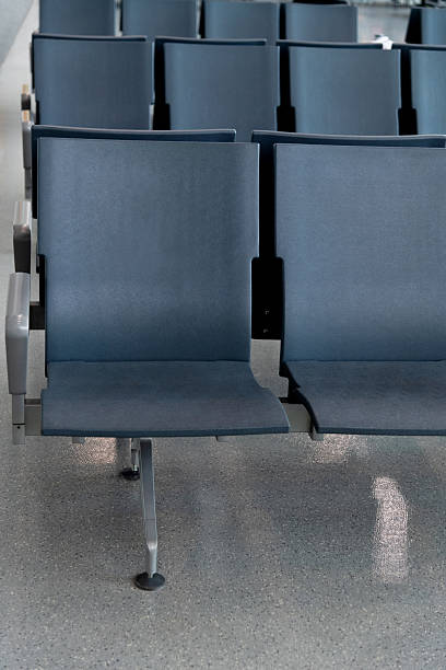 istock Empty chairs at airport waiting room 2235925783