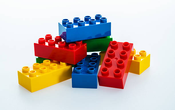 istock Heap of plastic toy blocks on white background 2235927115