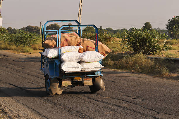 Autorickshaw driver on streets. Tempo Rickshaw, Chakdo rickshaw, Kharaghoda, rickshaw decorated motorcycle rickshaw, taxi rural highway in the Indian state of Gujarat. sakado rickshaw.