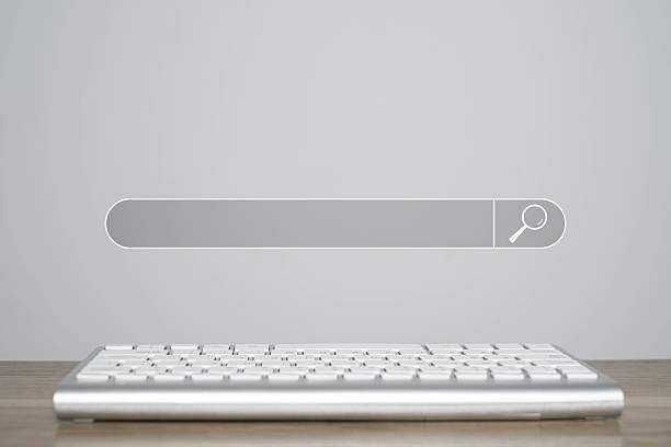 istock A minimalist image featuring a keyboard in front of a search bar, symbolizing online searching and digital interaction. 2235930911