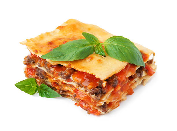 istock Delicious cooked lasagna with basil isolated on white 2235932376